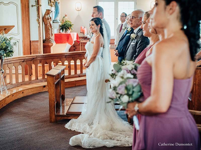 bride and groom at the Saint-Bernard Chapel in Tremblant