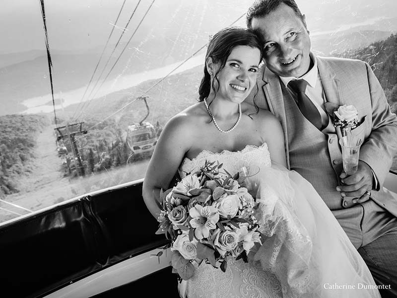 newlyweds in cable car in Mont Tremblant