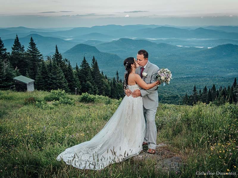 bride and groom at Mont Tremblant Grand Manitou summit