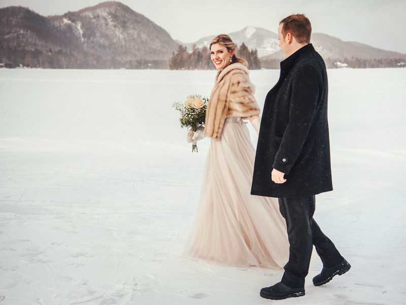 Newlyweds walking on Lac Superieur in Tremblant